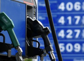 Gas and diesel pumps along with gas prices are shown at an Exxon gas station in Carlsbad