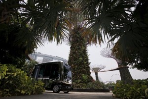 An autonomous self-driving vehicle shuttles member of the media during a demonstration at Gardens by the Bay in Singapore