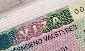 56556972 - schengen visa in passport