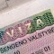 56556972 - schengen visa in passport