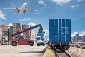 forklift handling container box loading to freight train