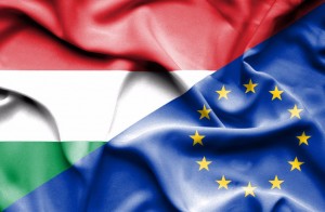 Waving flag of European Union and Hungary