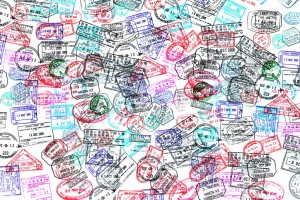 Background of passport stamps on white